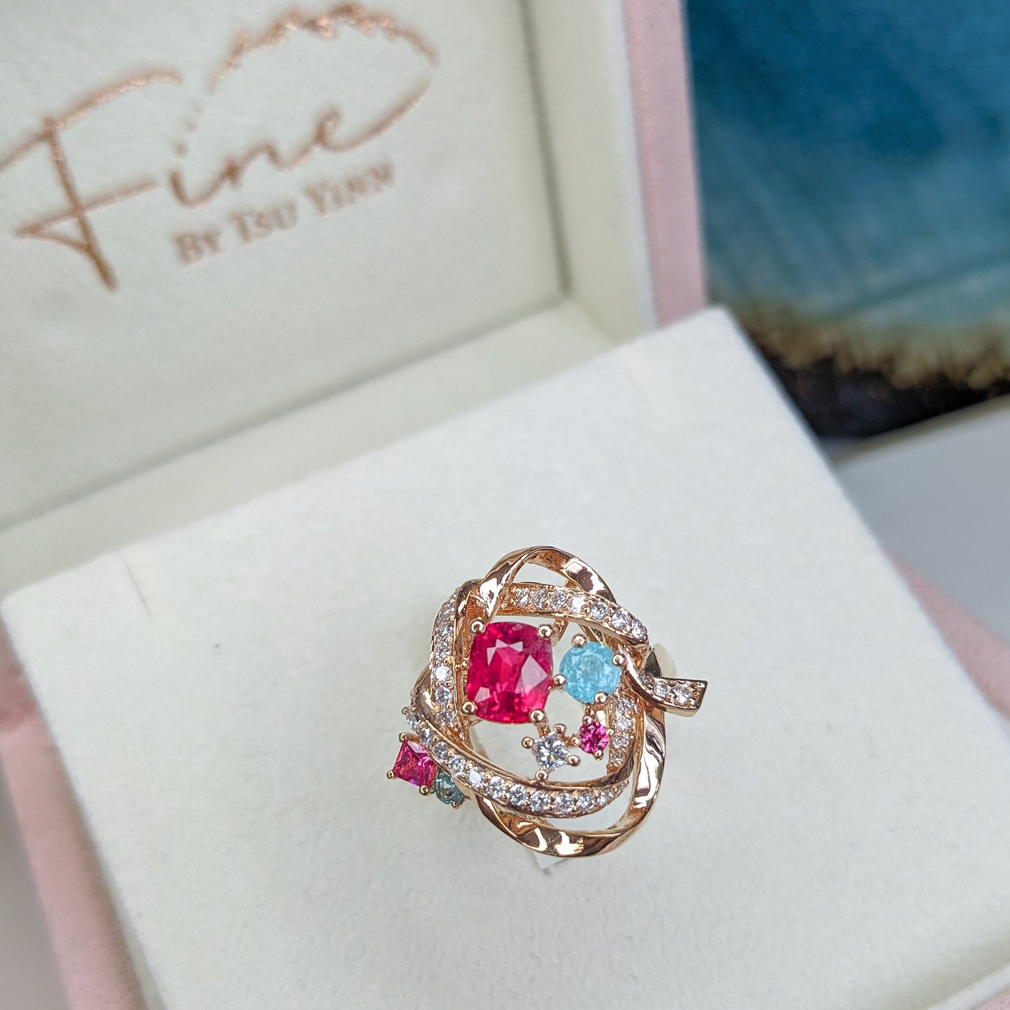 RG Mogok Pink Spinel and Paraiba Tourmaline Interlocking Ribbons Ring