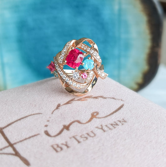RG Mogok Pink Spinel and Paraiba Tourmaline Interlocking Ribbons Ring