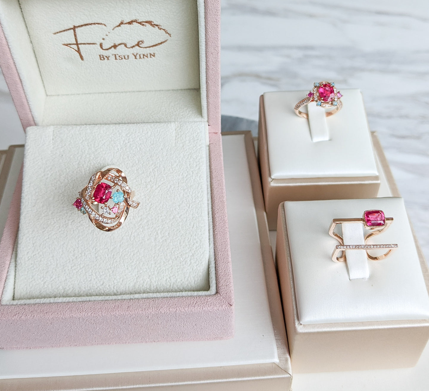 RG Mogok Pink Spinel and Paraiba Tourmaline Interlocking Ribbons Ring