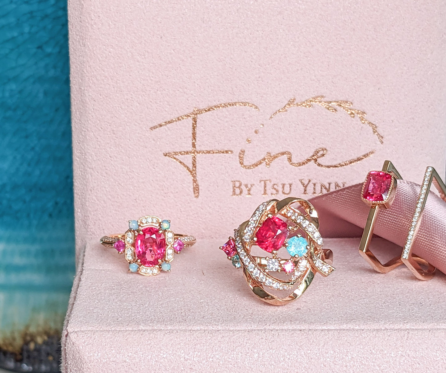 RG Mogok Pink Spinel and Paraiba Tourmaline Interlocking Ribbons Ring