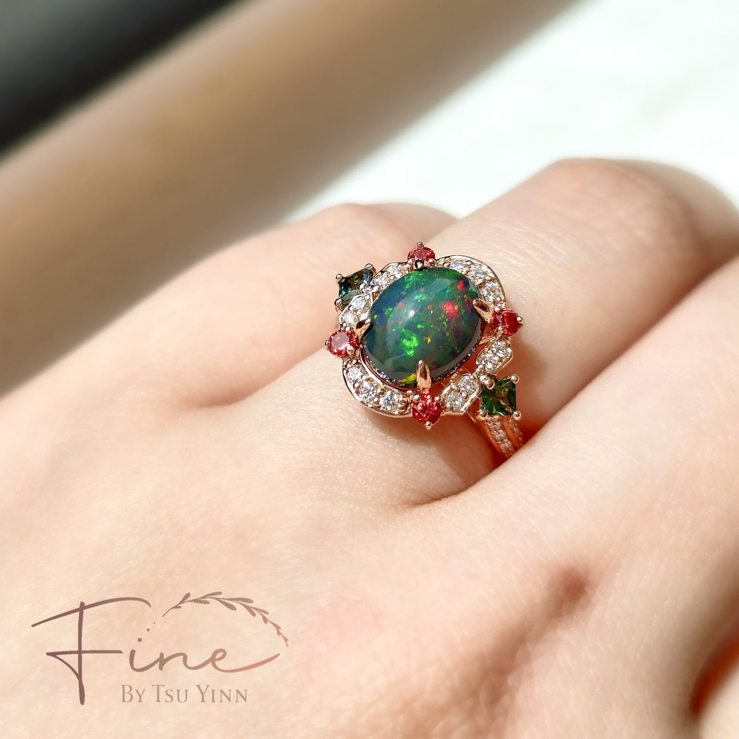 FBTY Kyra Ring with Black Opal Cabochon, Green Sapphires, Dark Orange Spinels and White Diamonds