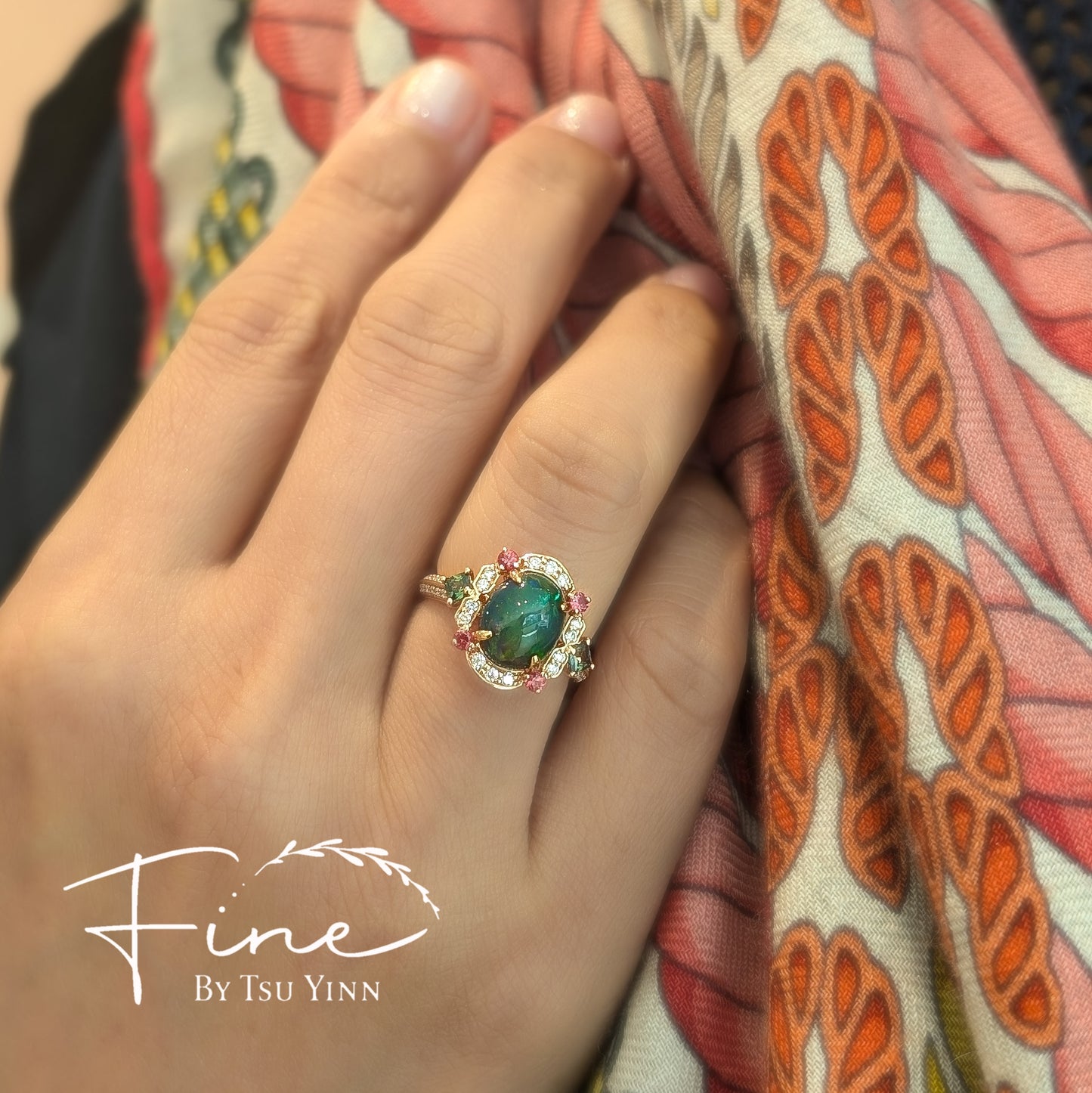 FBTY Kyra Ring with Black Opal Cabochon, Green Sapphires, Dark Orange Spinels and White Diamonds