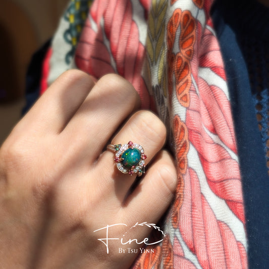 FBTY Kyra Ring with Black Opal Cabochon, Green Sapphires, Dark Orange Spinels and White Diamonds